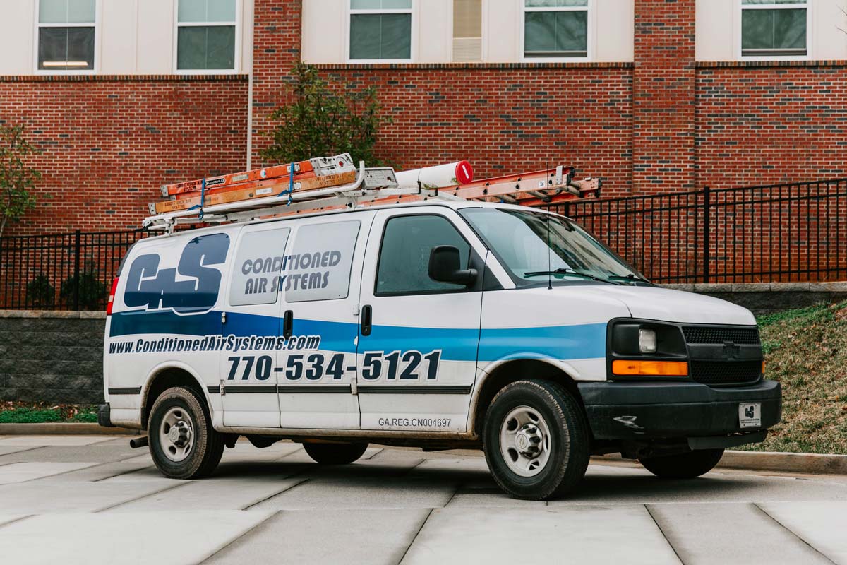 Conditioned Air Systems van arriving for repair