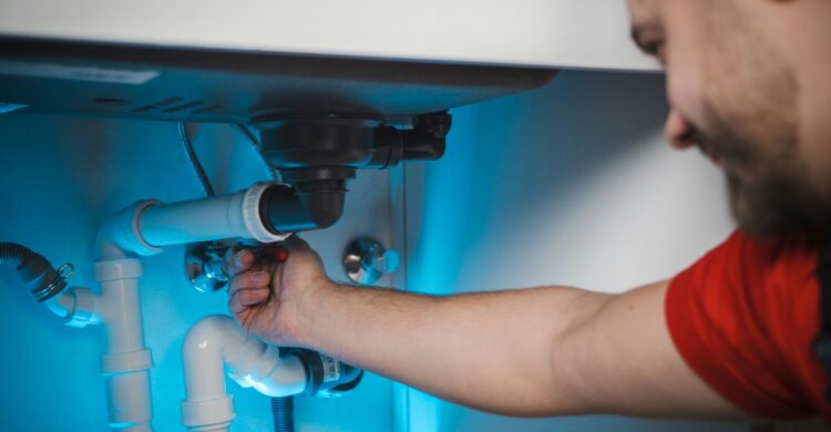 man making regular pipe inspections